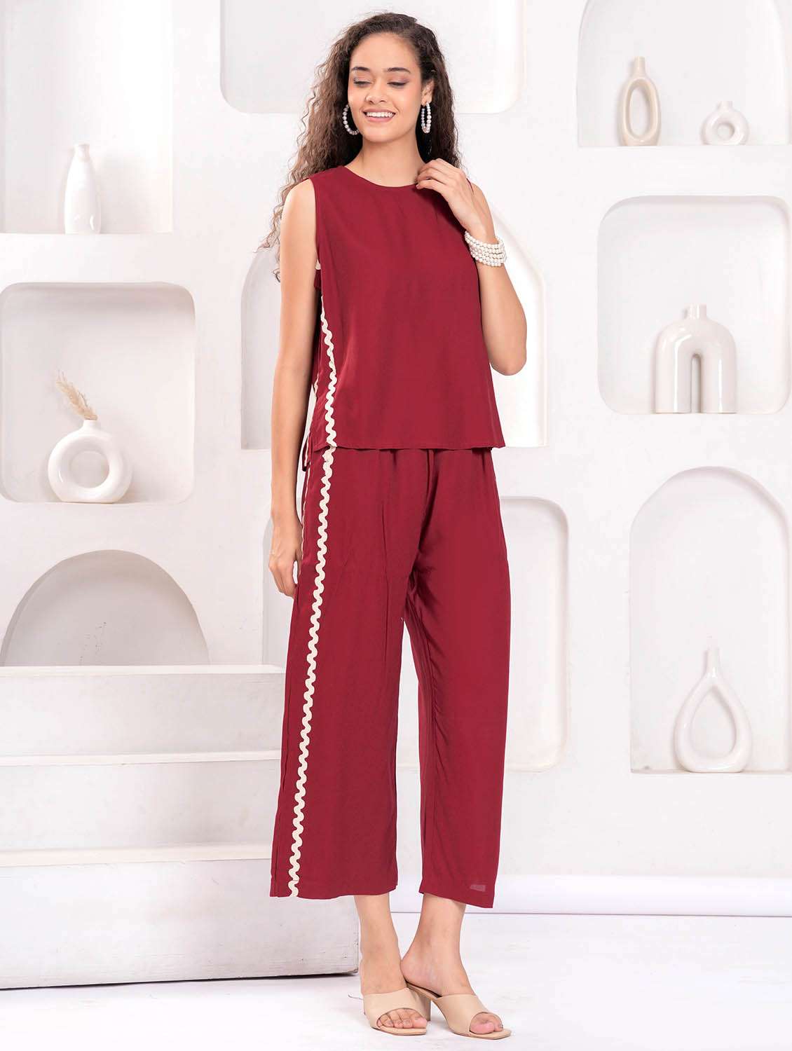 women solid sleeveless top and trouser co-ord set