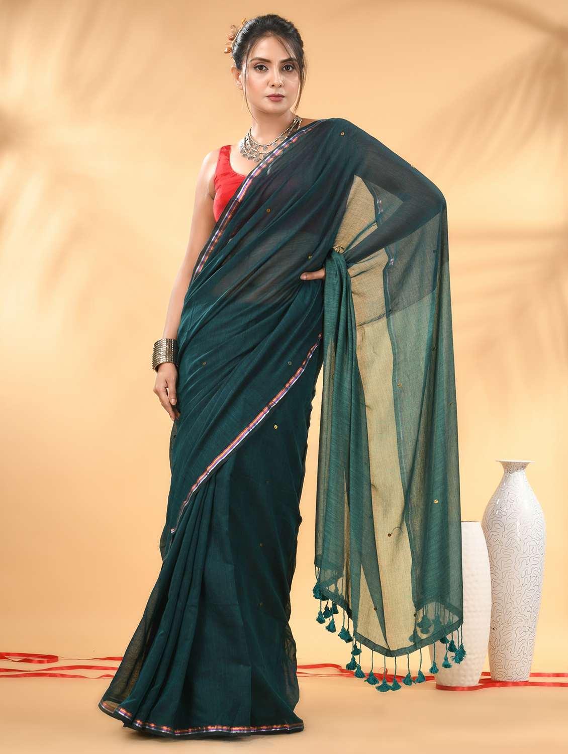 women teal handloom saree with blouse