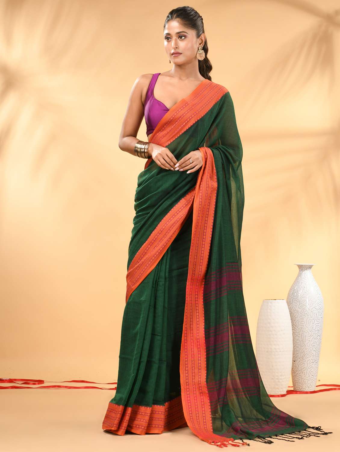 women solid with bordered handloom saree with blouse