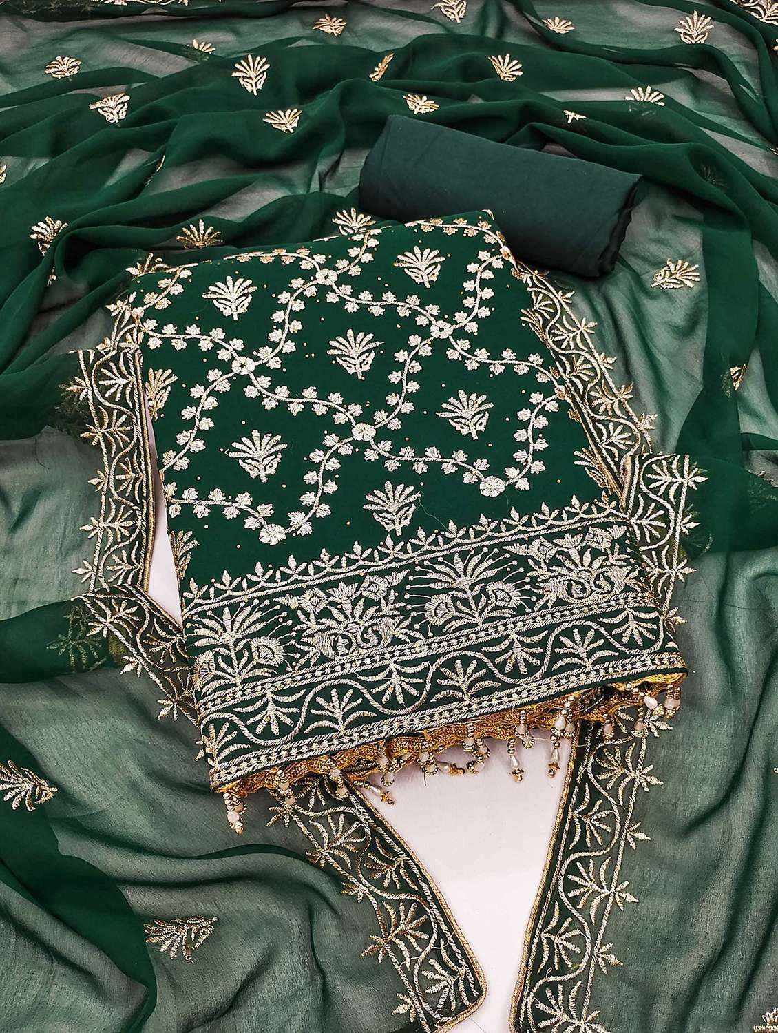 women solid with work embroidered unstitched suit set