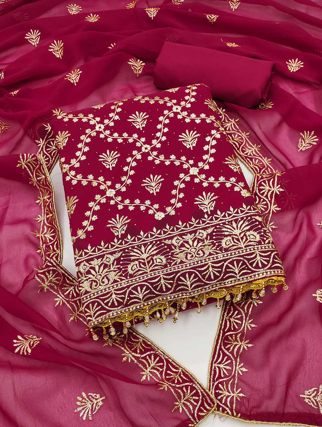 women solid with work embroidered unstitched suit set