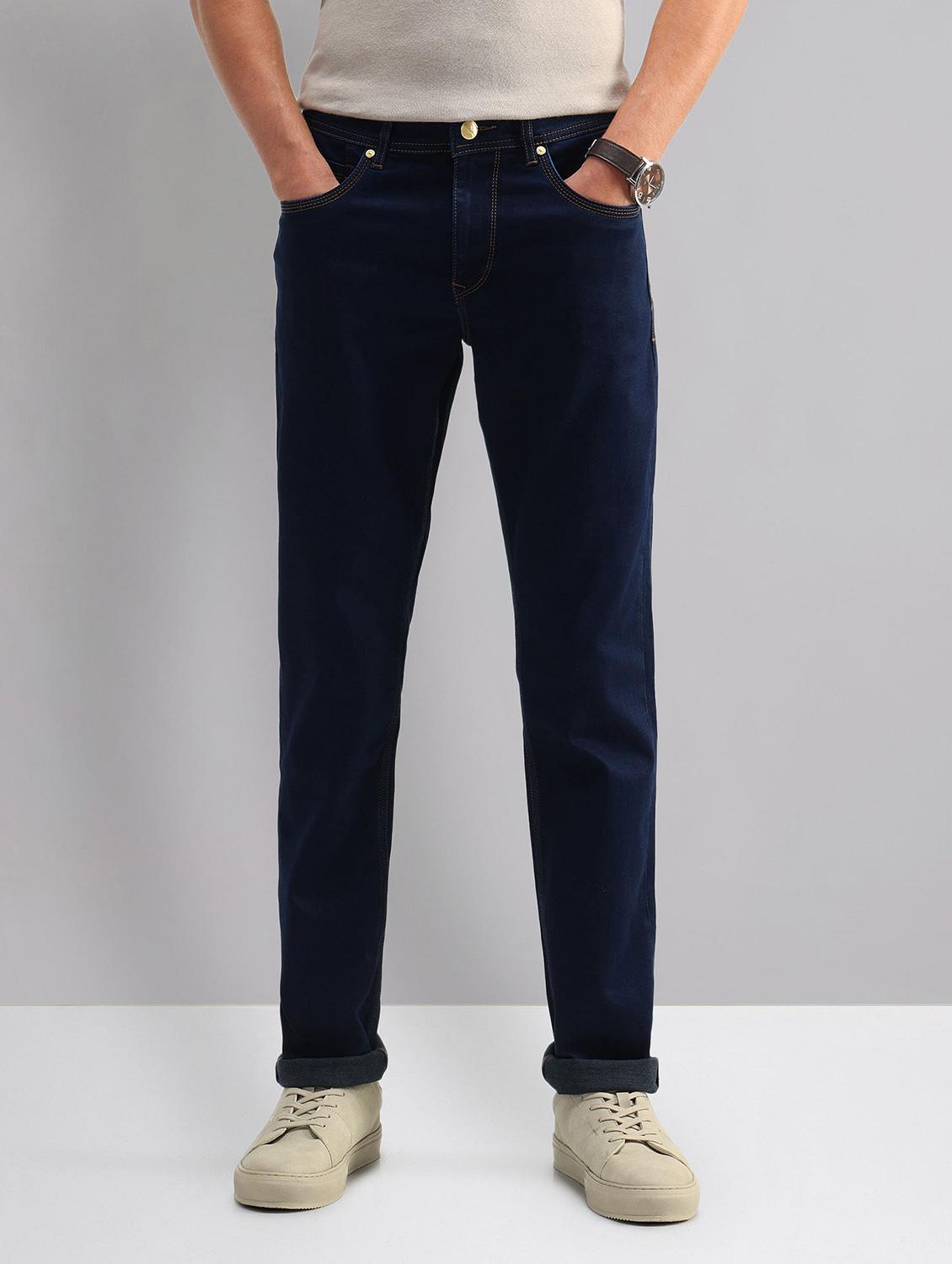 men solid mid rise slim fit jeans