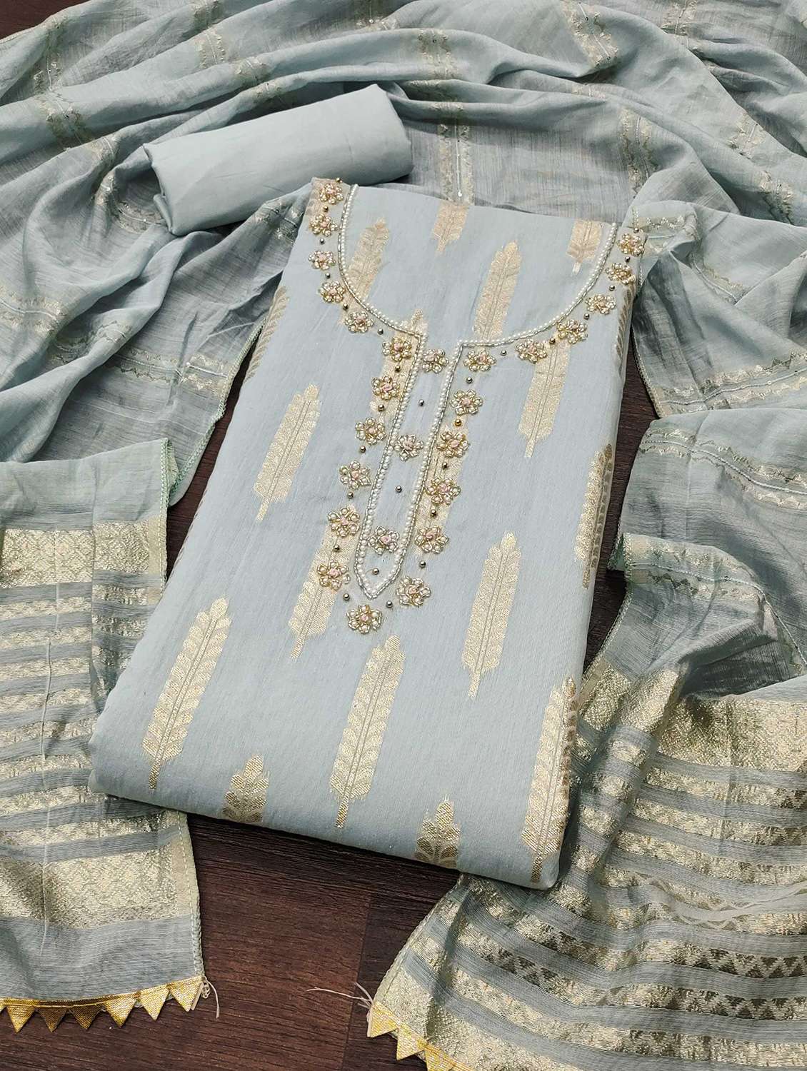 women self design embroidered unstitched suit set