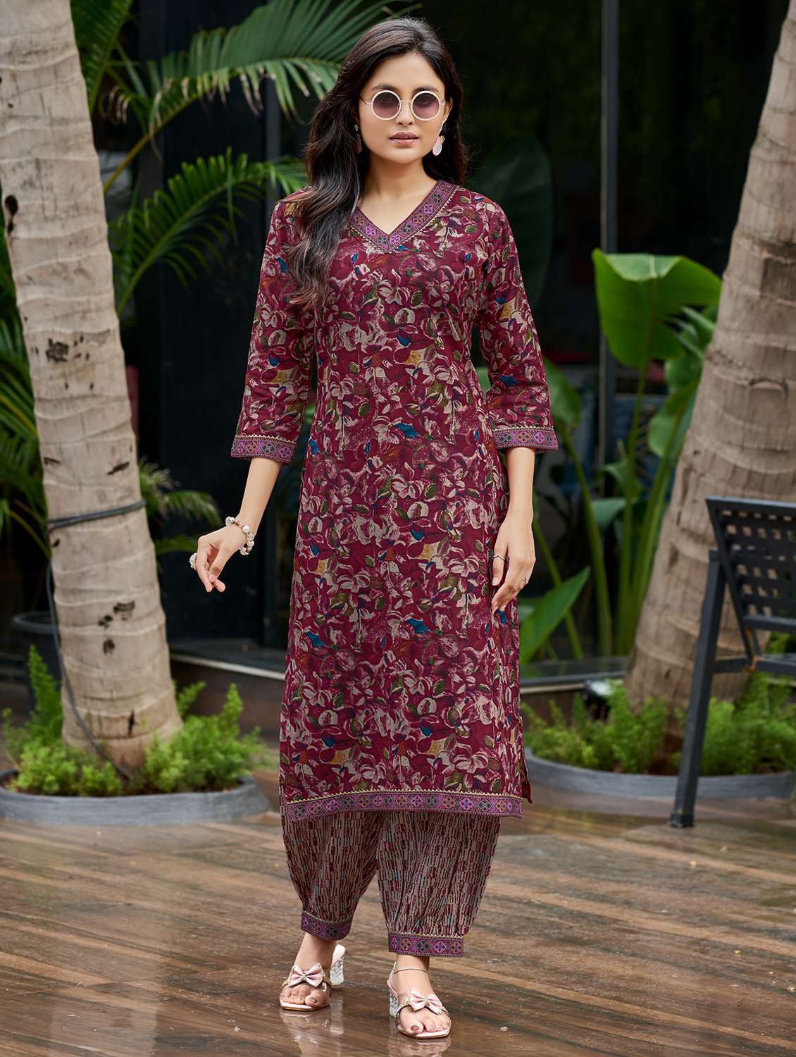 women printed three quarter sleeve kurta and salwar set