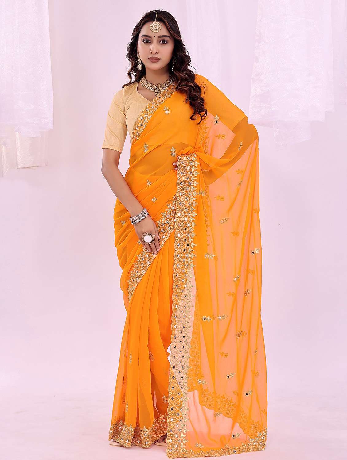 women solid with work embroidered saree with blouse