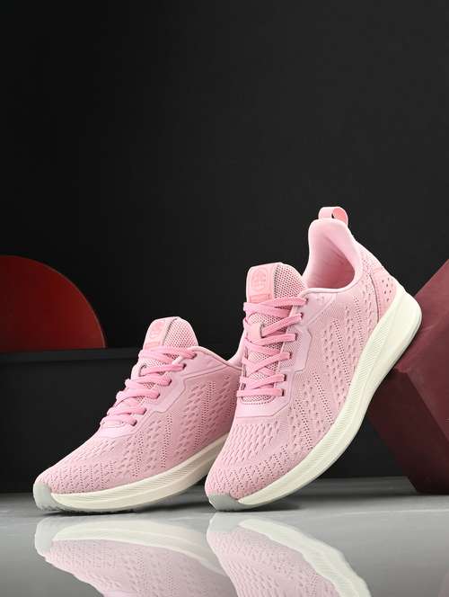 pink flyknit laceup sports shoes