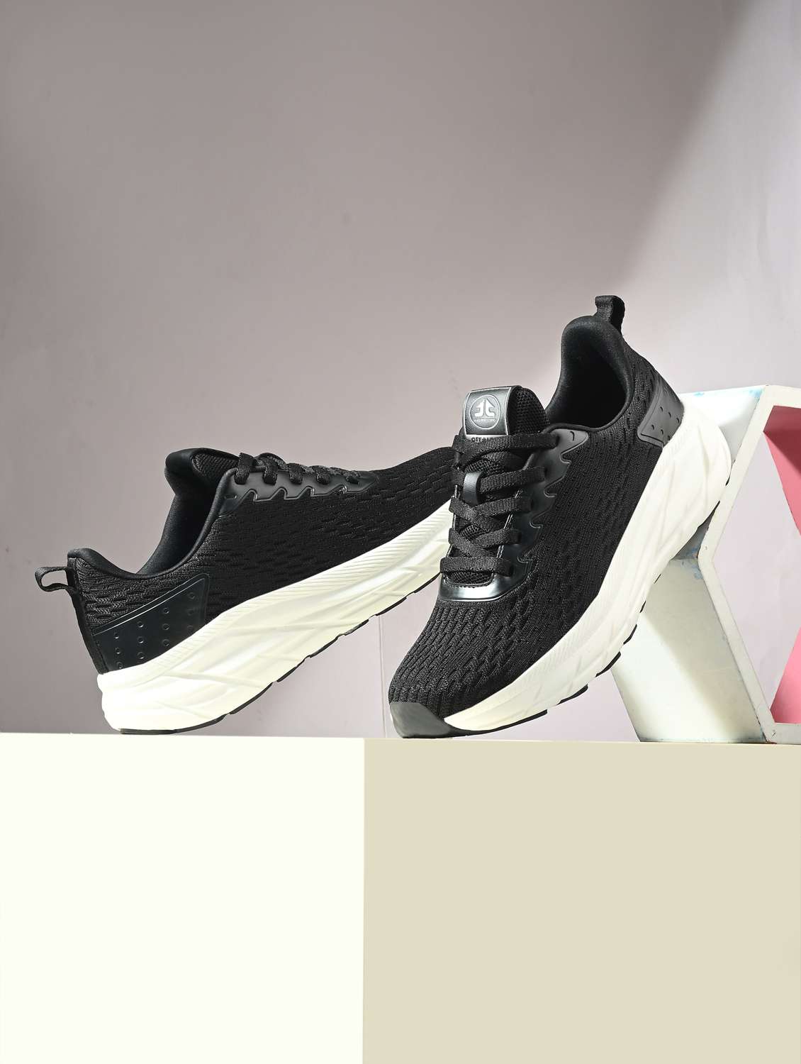 black flyknit laceup sports shoes