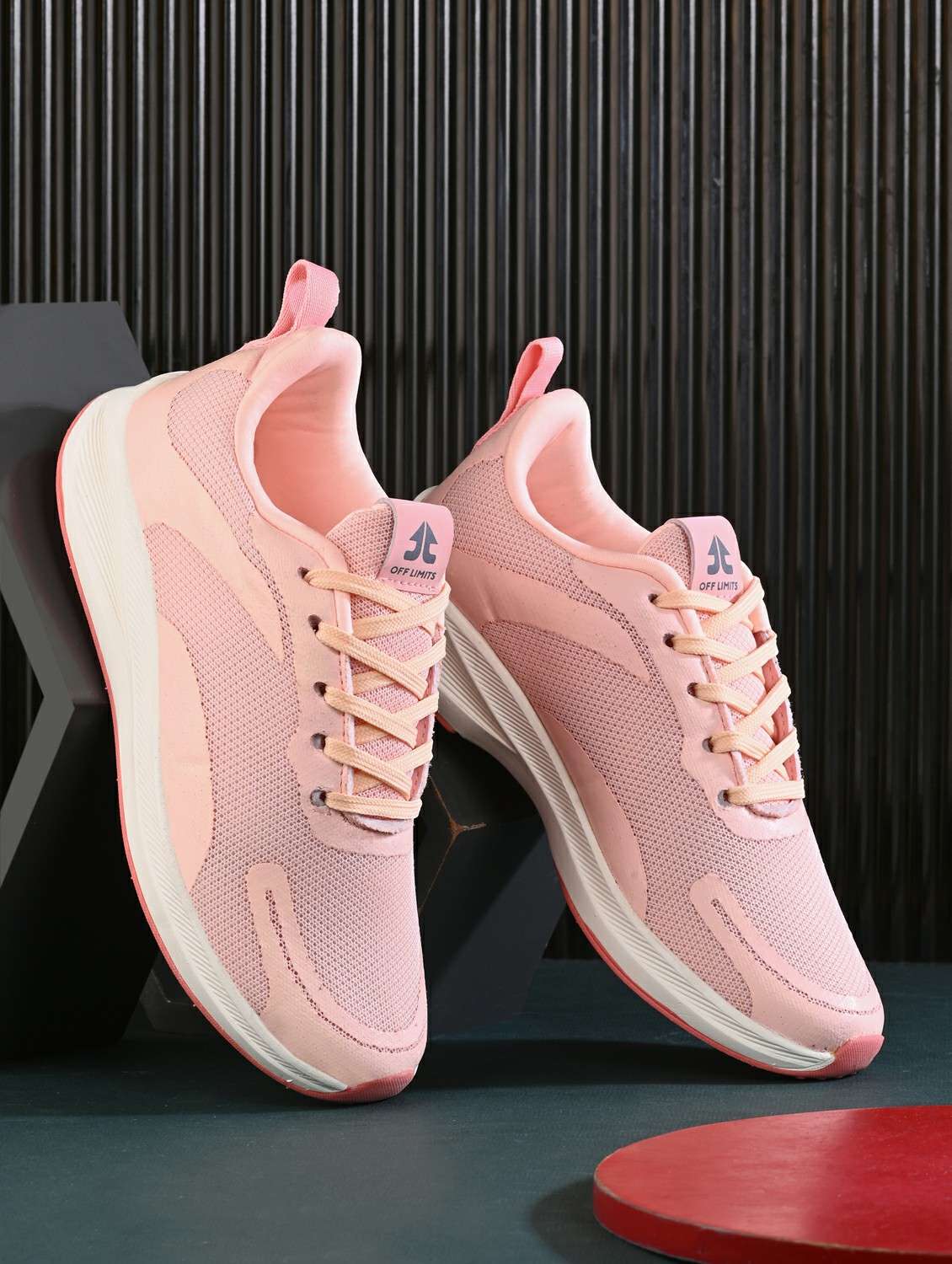 pink flyknit laceup sports shoes