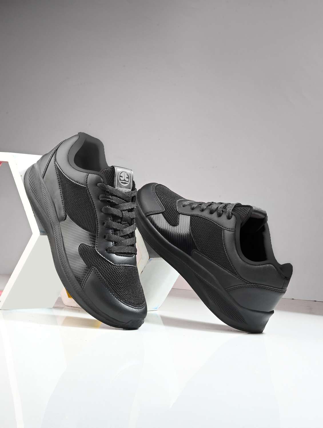 black synthetic & mesh laceup sports shoes