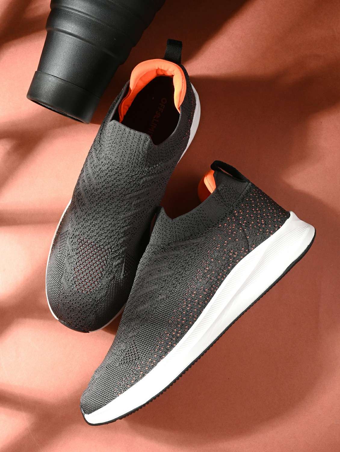 men solid grey slip on sport shoe