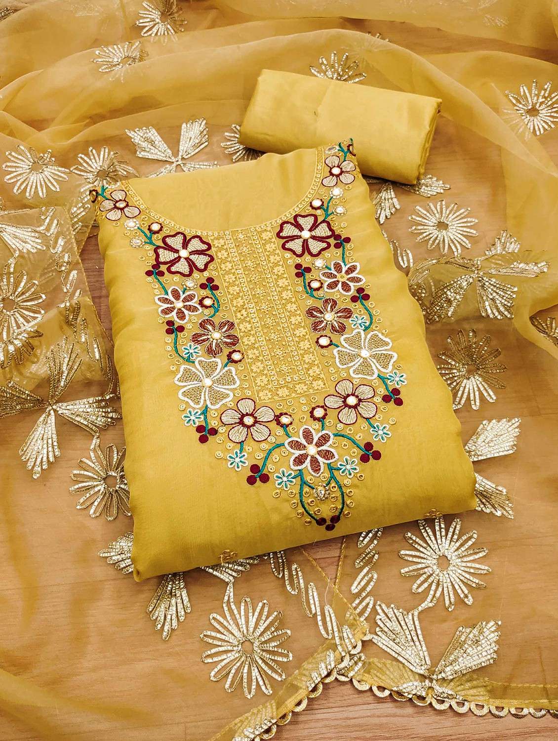 women solid with work embroidered unstitched suit set