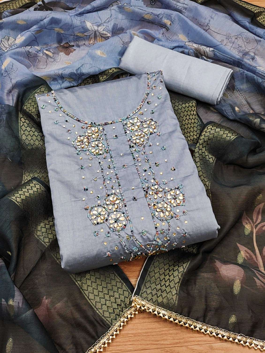 women solid with work embroidered unstitched suit set