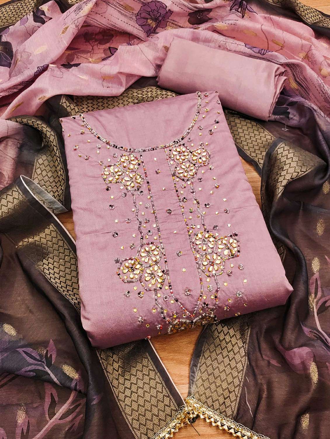 women solid with work embroidered unstitched suit set