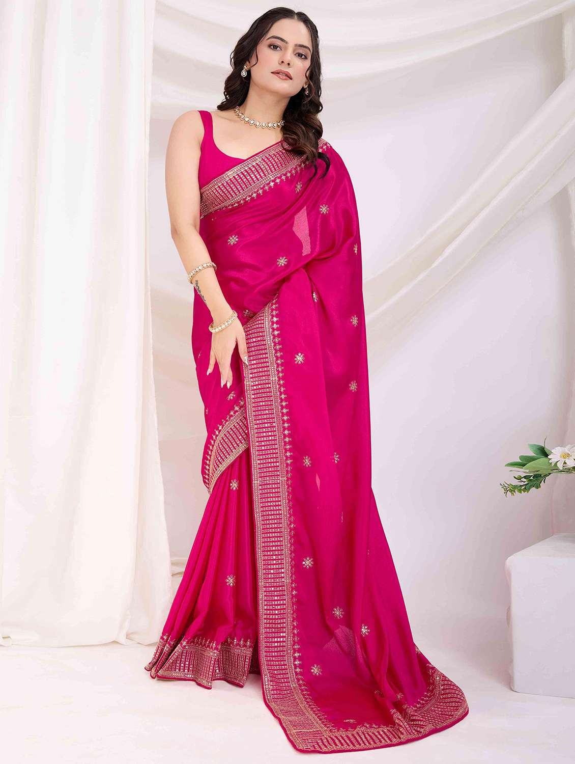 women solid with work embroidered saree with blouse