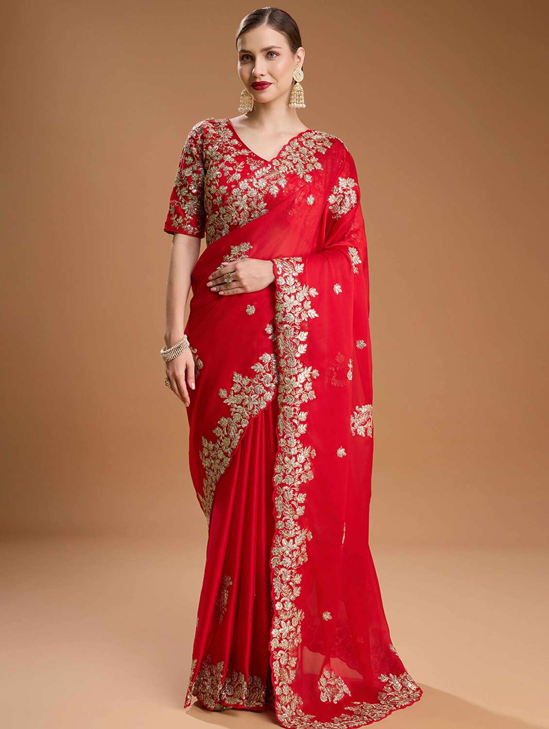women solid with work embroidered saree with blouse