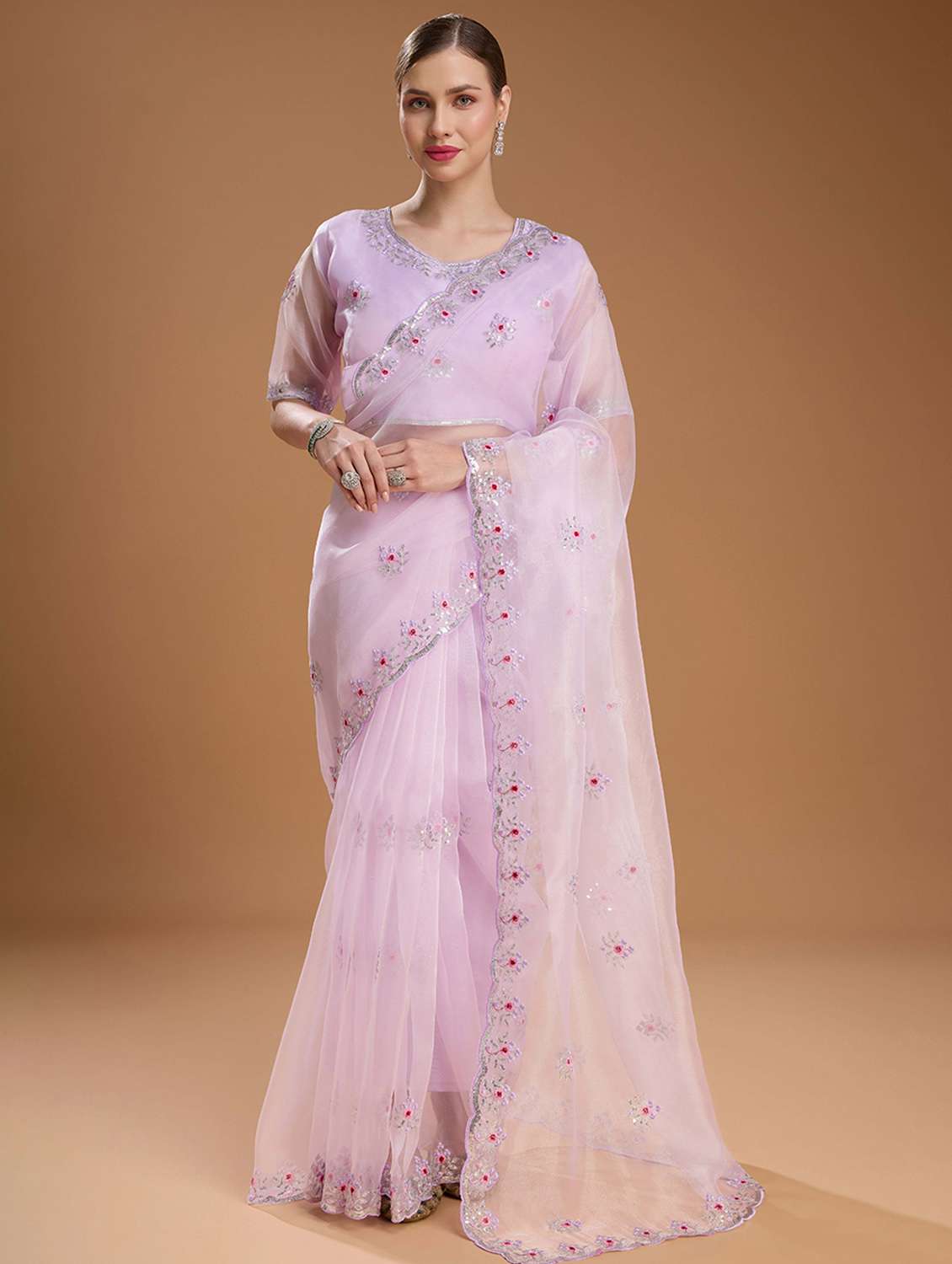 women solid with work embroidered saree with blouse