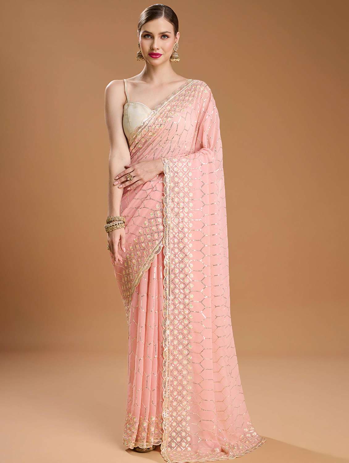 women solid with work embellished saree with blouse
