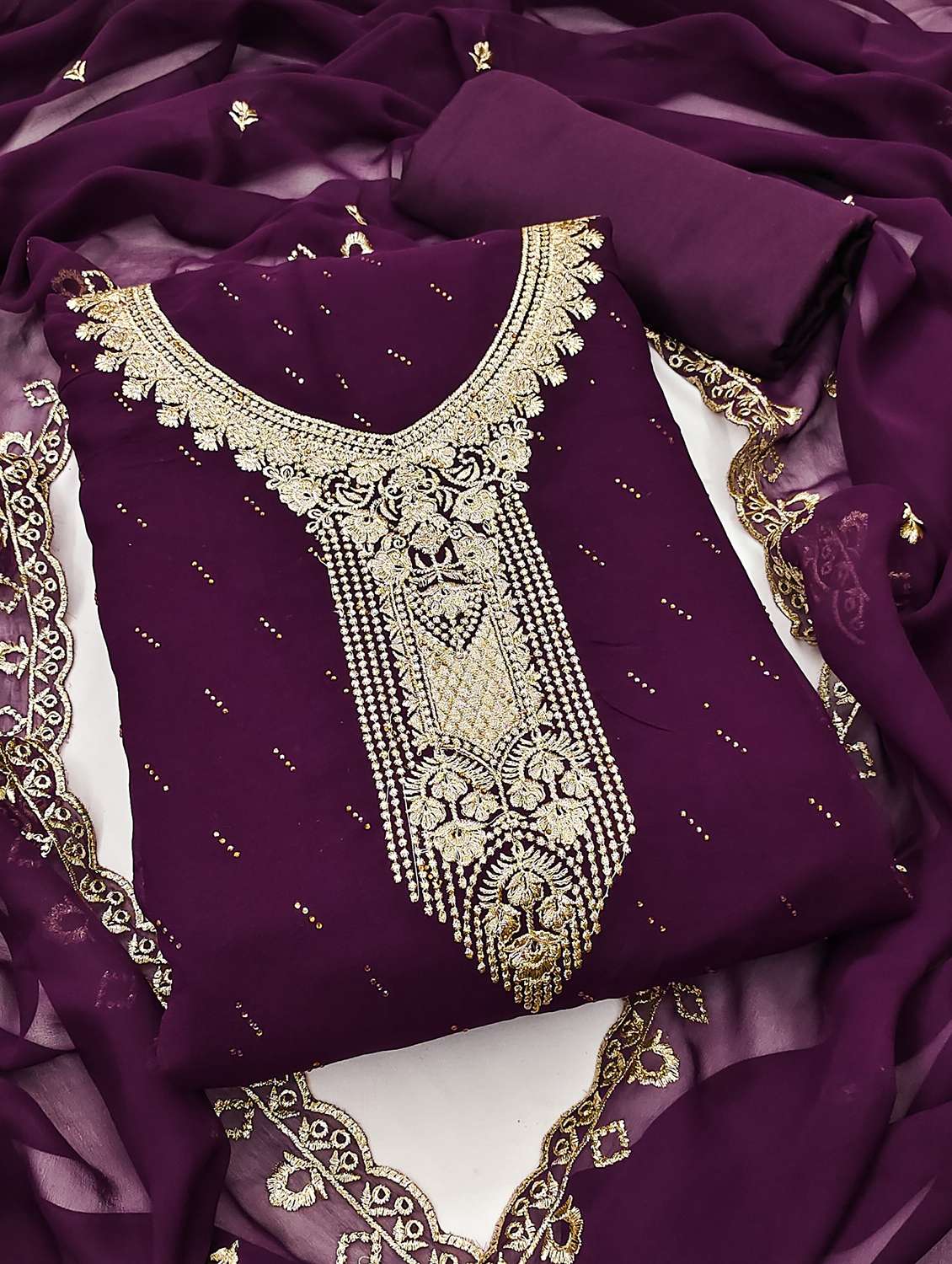 women solid with work embroidered unstitched suit set