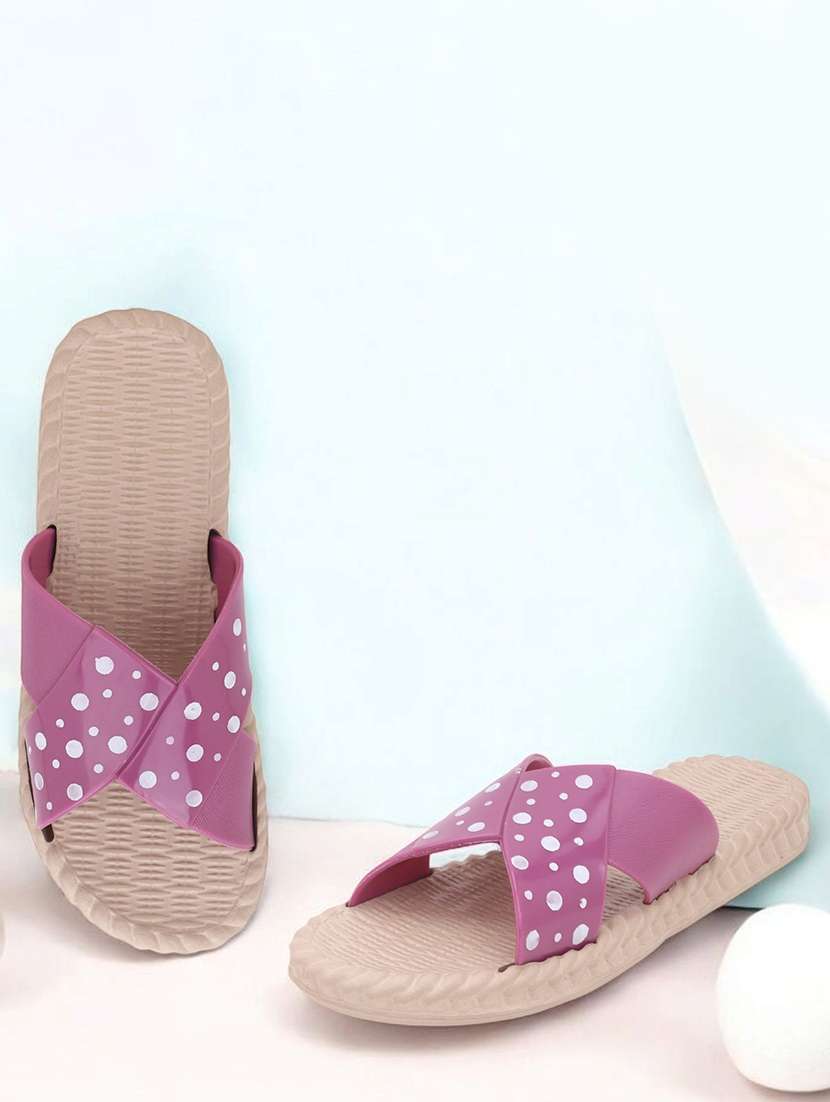 women purple polka doted slides 