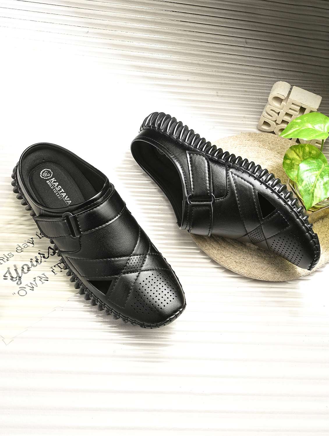 men solid black slip on mule