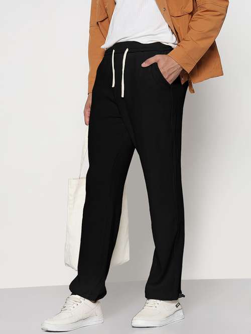 men solid mid rise relaxed fit track pant - 22038054 -  Standard Image - 0