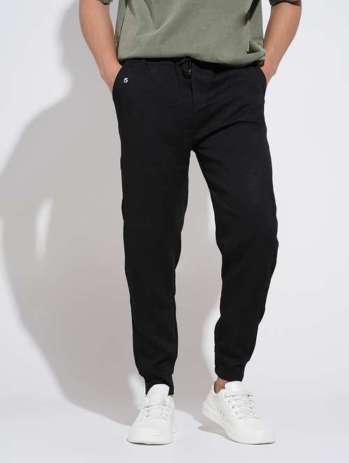 men black solid mid rise regular fit jogger - 22038073 - Standard Image - 0