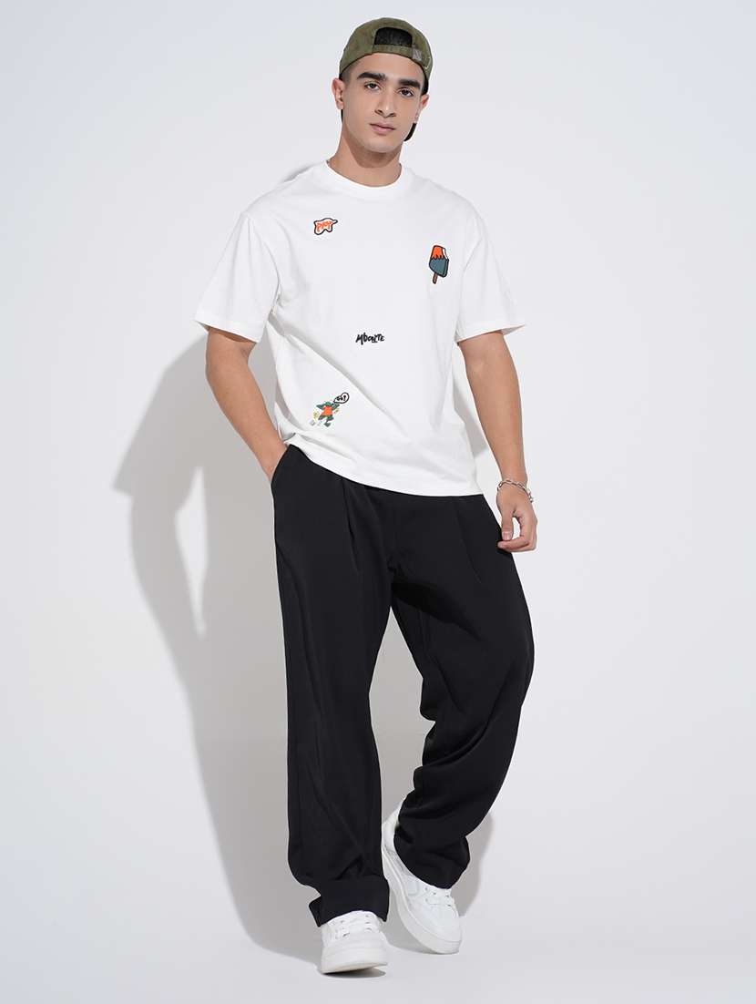 men black solid low rise loose fit parachute pant - 22038095 -  Standard Image - 1