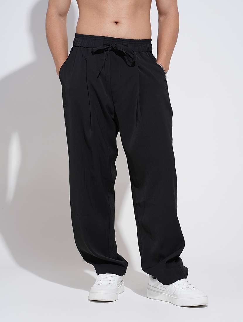 men black solid low rise loose fit parachute pant - 22038095 -  Standard Image - 4
