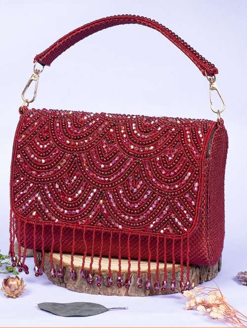 women embellished clutche
