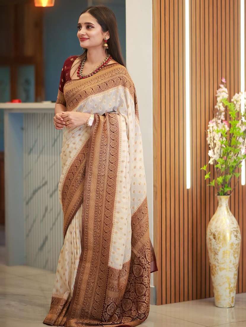 women self design banarasi saree with blouse