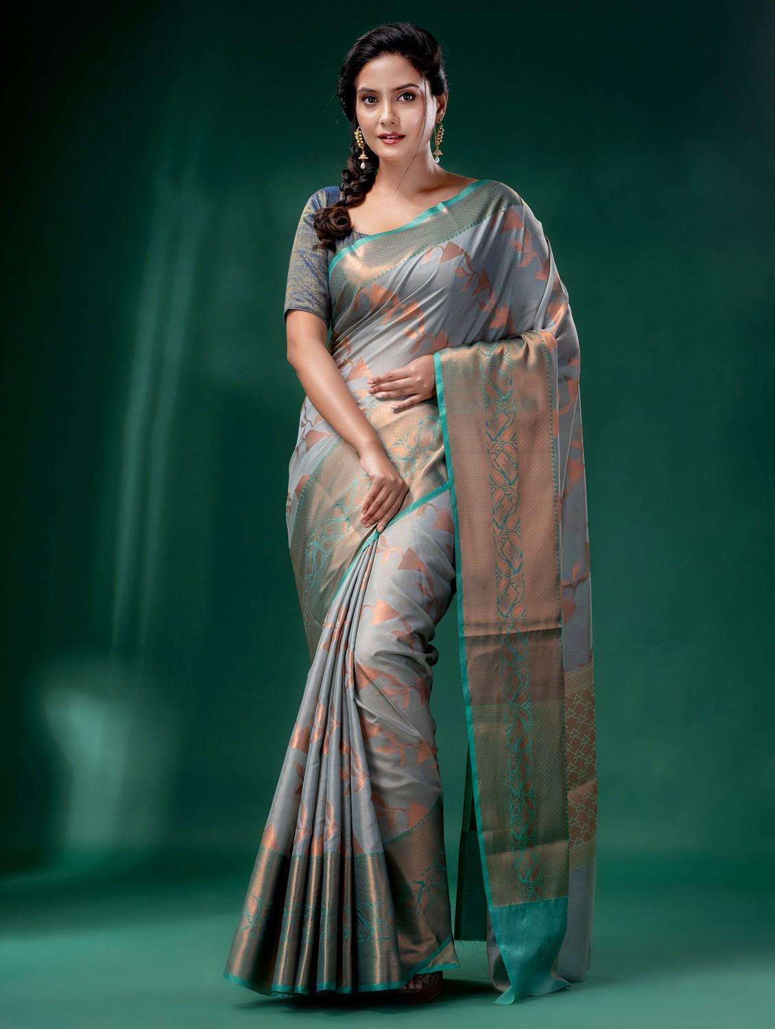 women self design banarasi saree with blouse