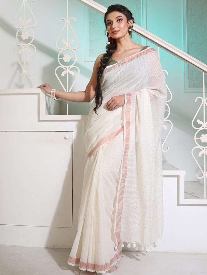 women solid with work embellished saree with blouse