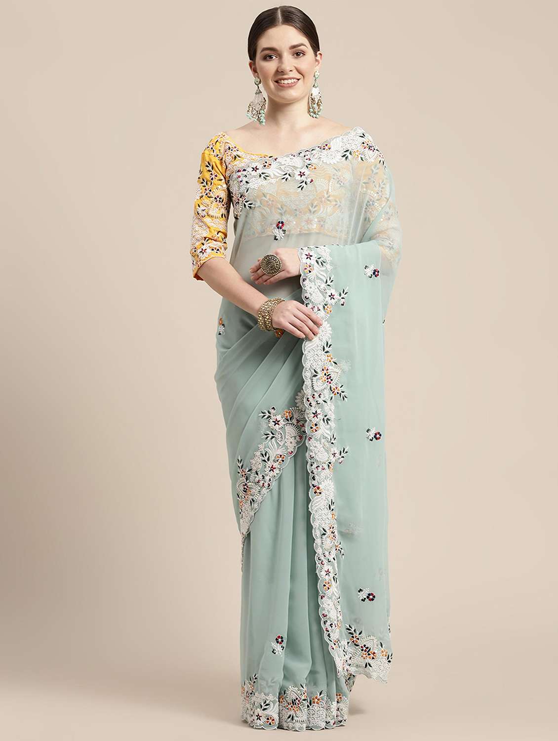 women solid with work embroidered saree with blouse