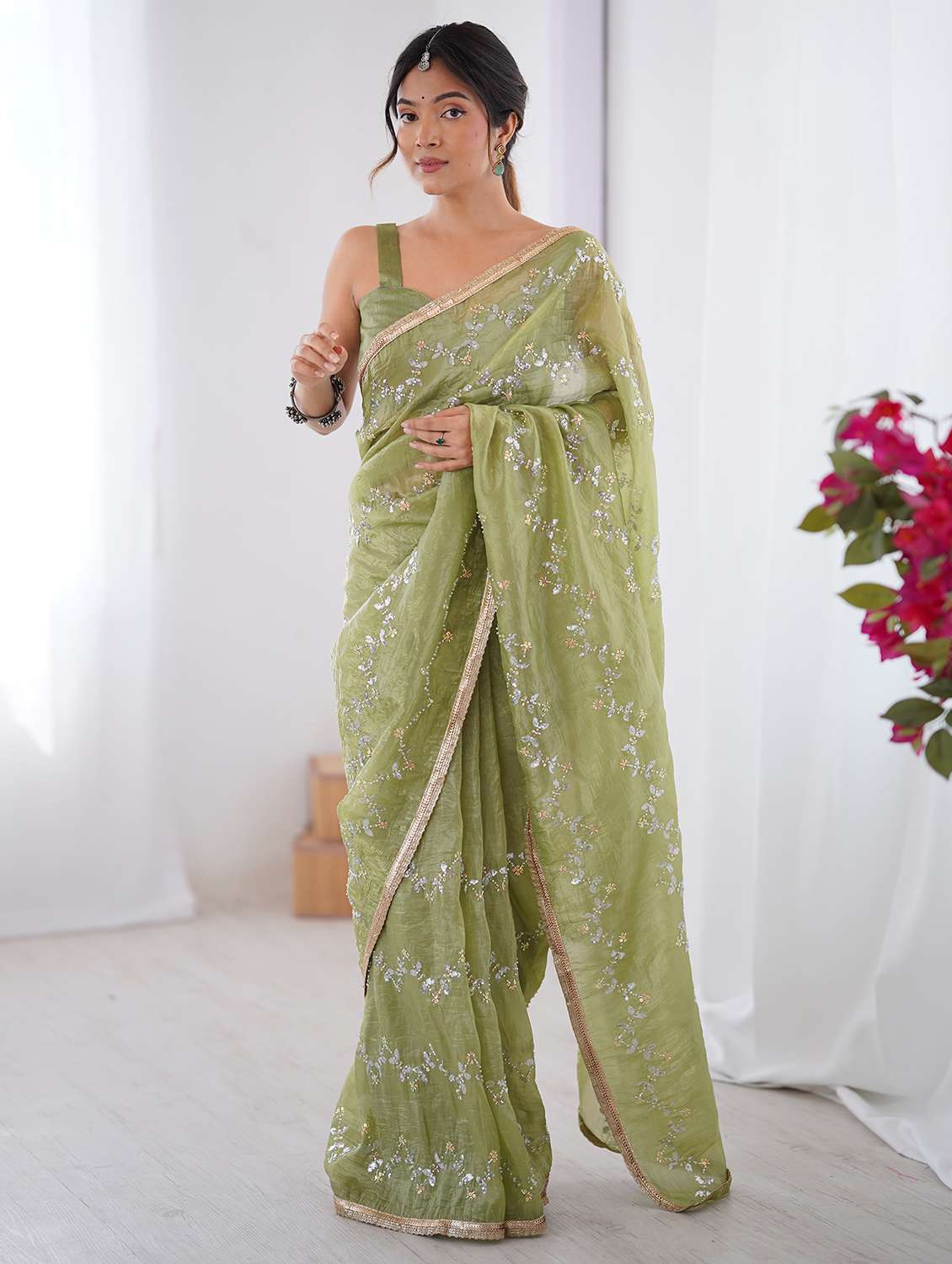 women solid with work embellished saree with blouse