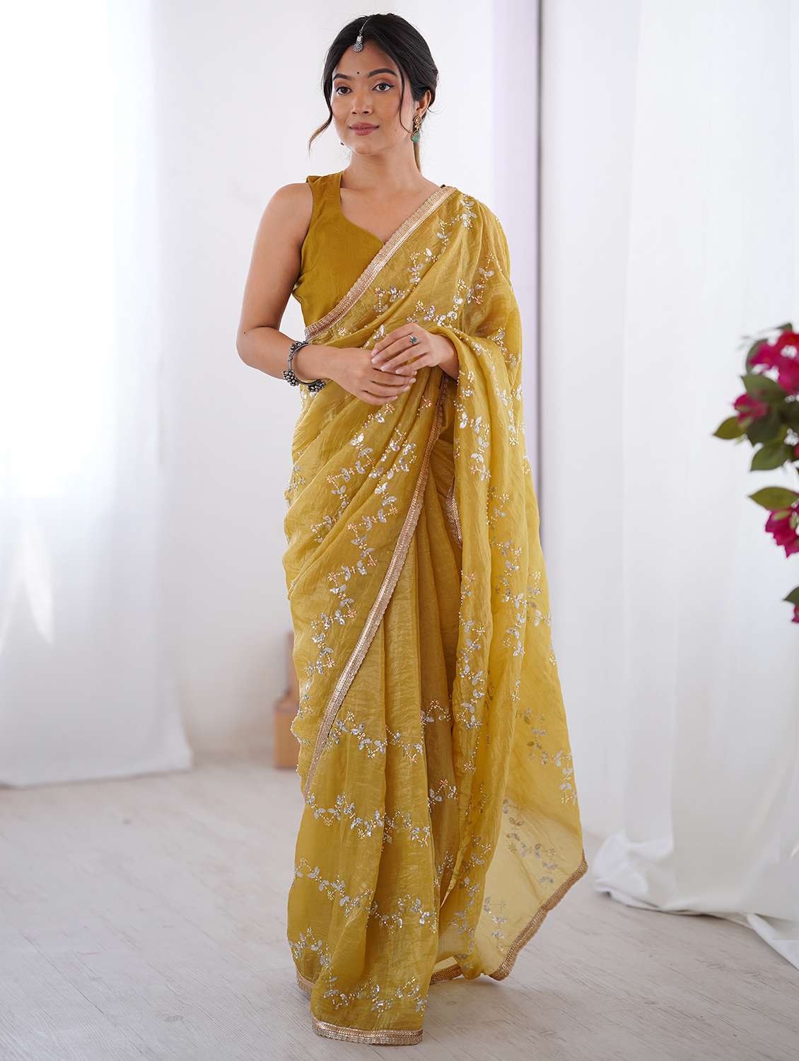 women solid with work embellished saree with blouse