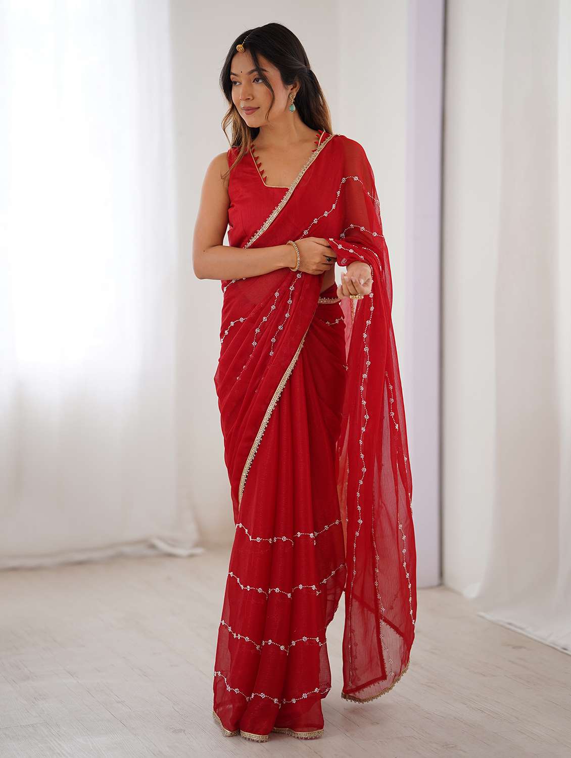 women solid with work embellished saree with blouse