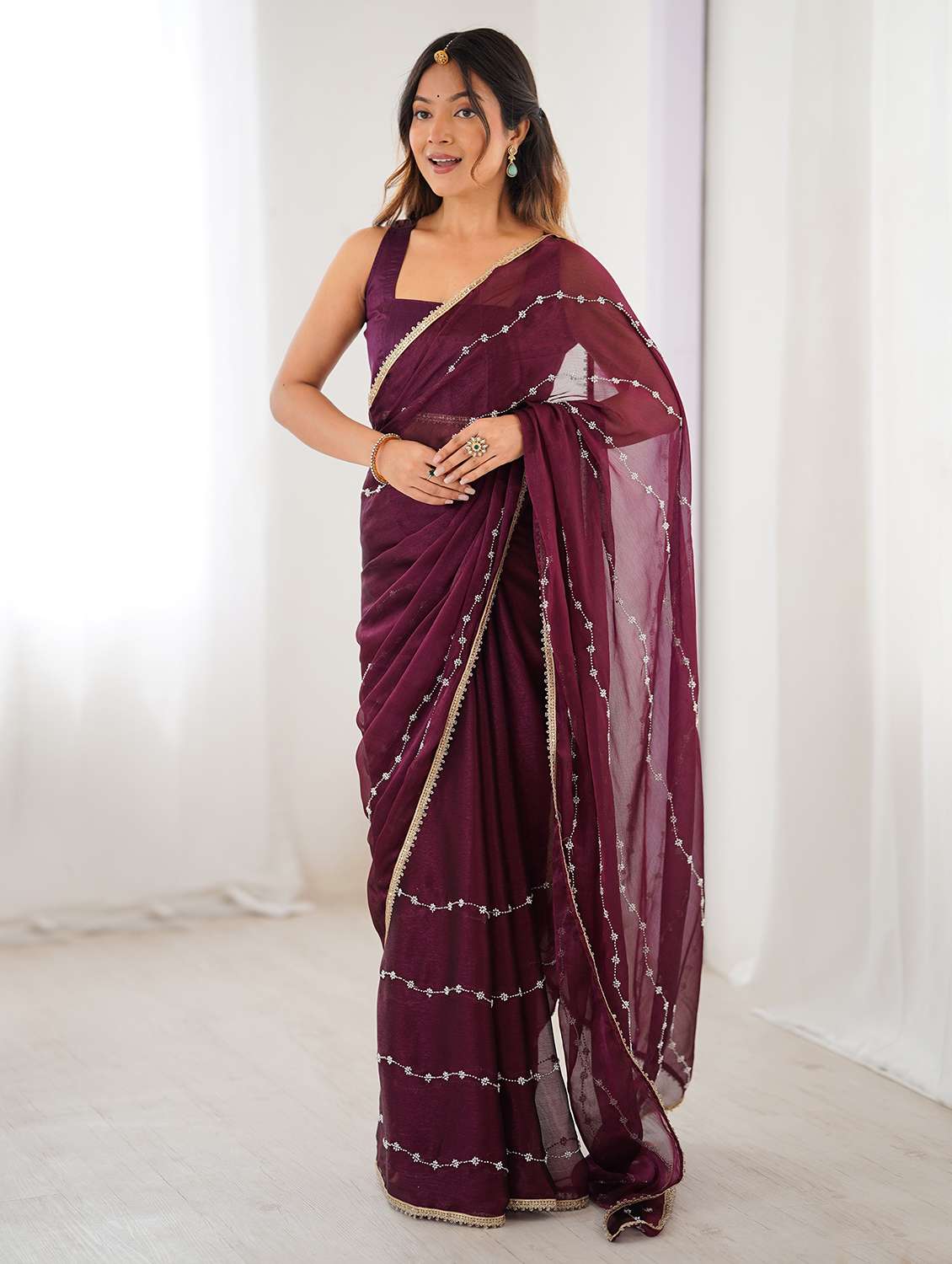 women solid with work embellished saree with blouse