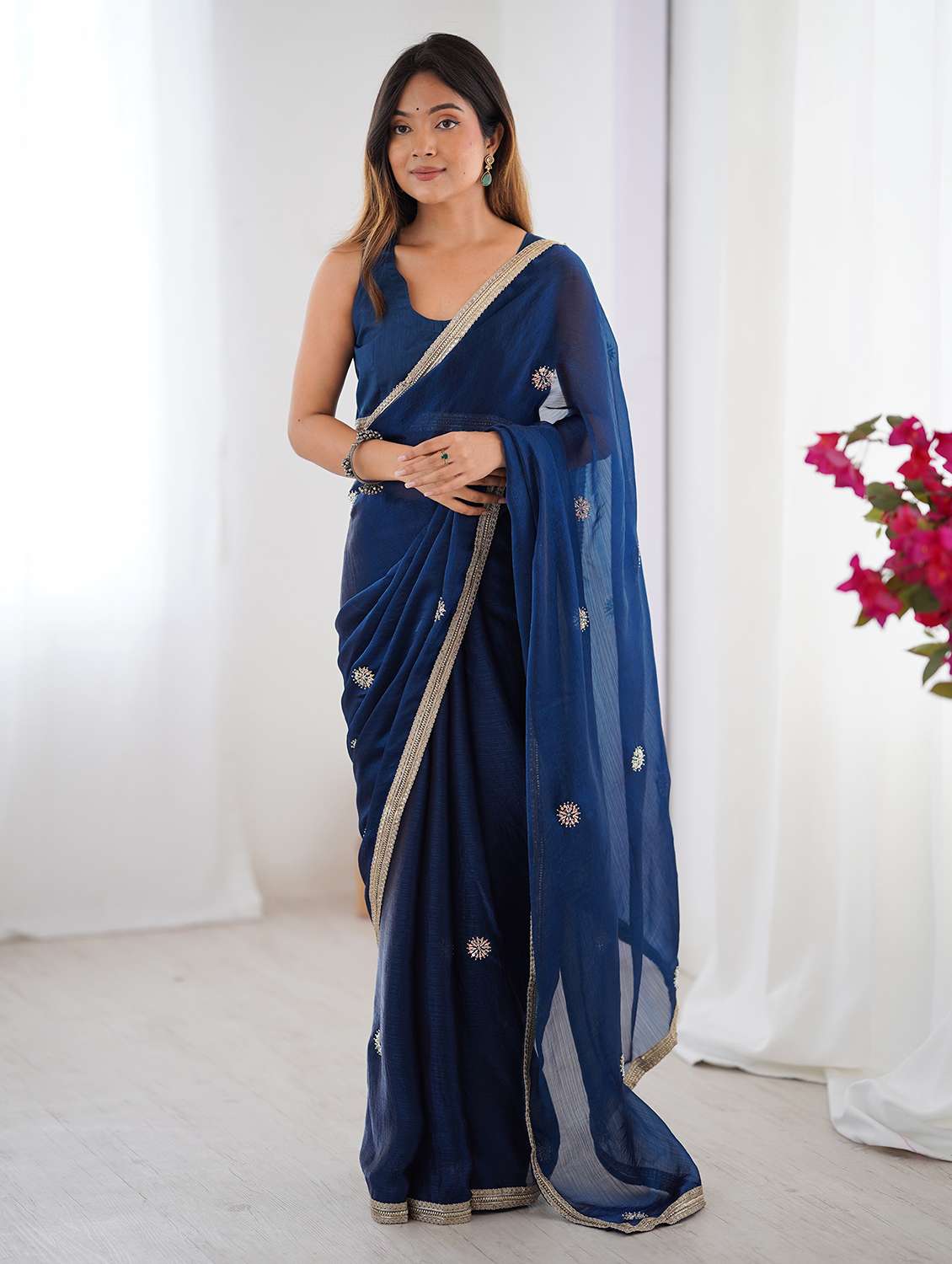 women solid with work embellished saree with blouse