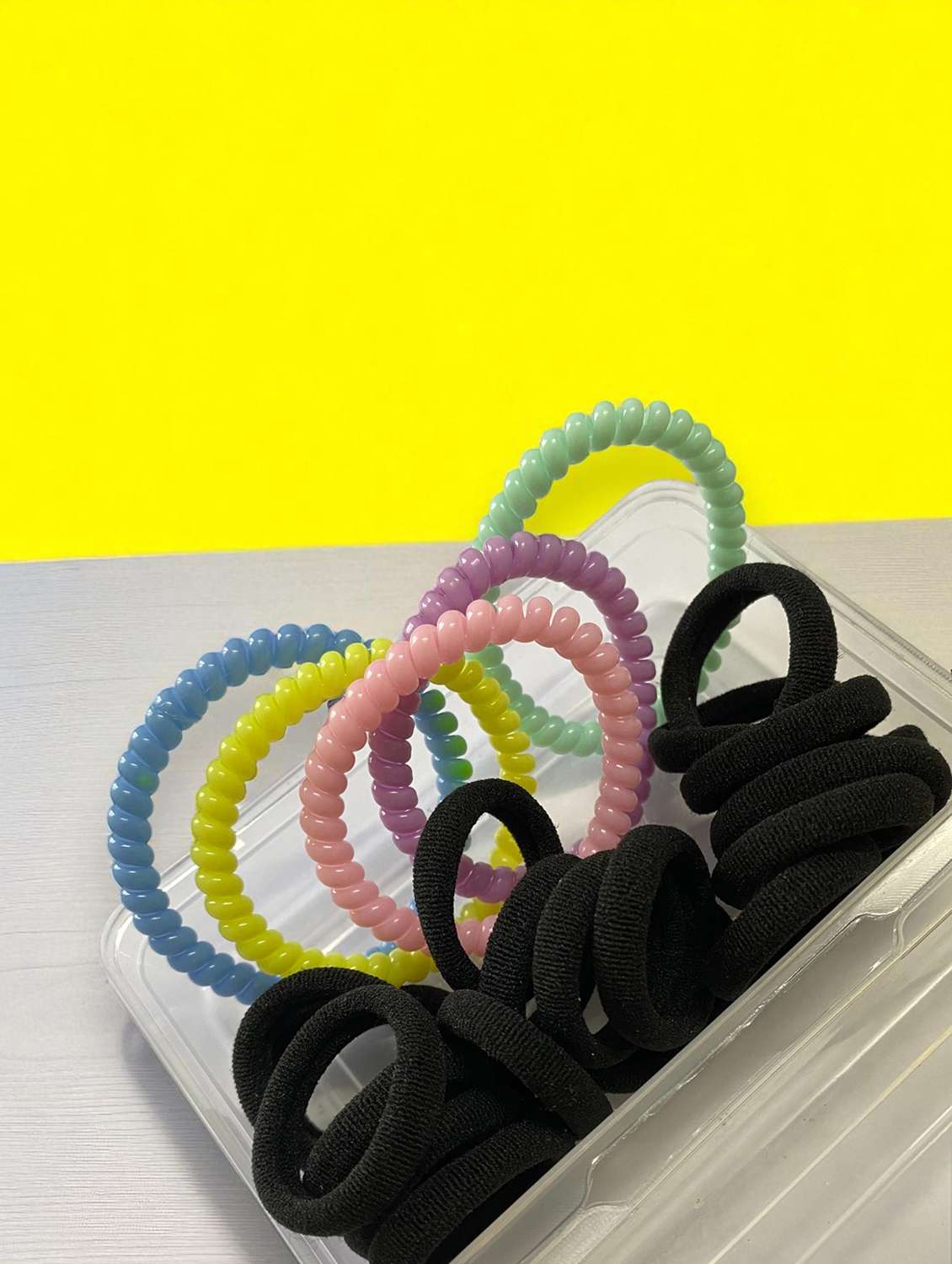 set of multi-color plastic scrunchies  - 22051998 -  Standard Image - 1