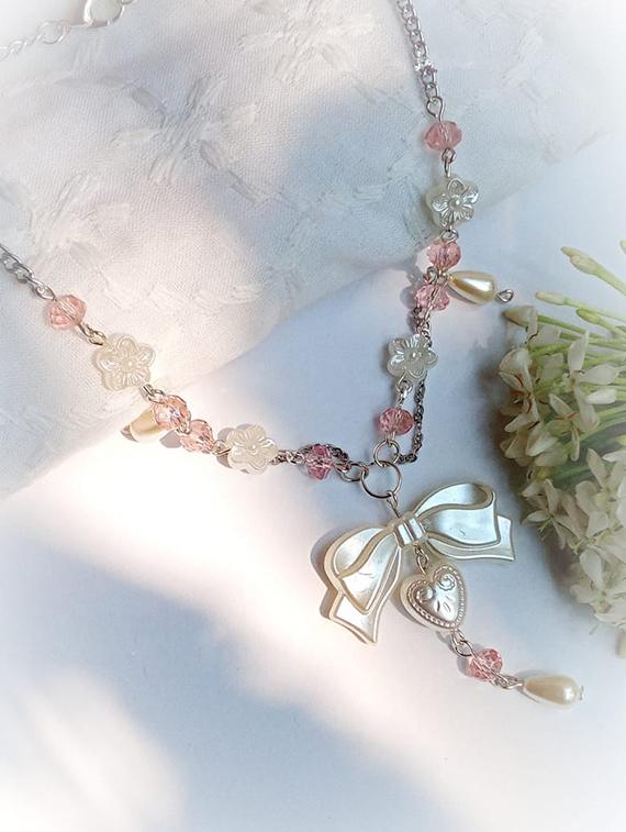 pearl beaded bow detailed necklace - 22055059 - Zoom Image - 0