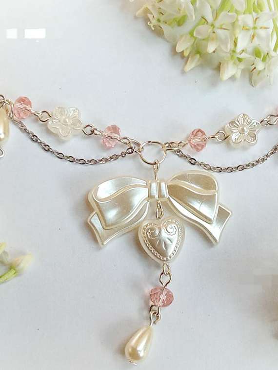 pearl beaded bow detailed necklace - 22055059 - Zoom Image - 0