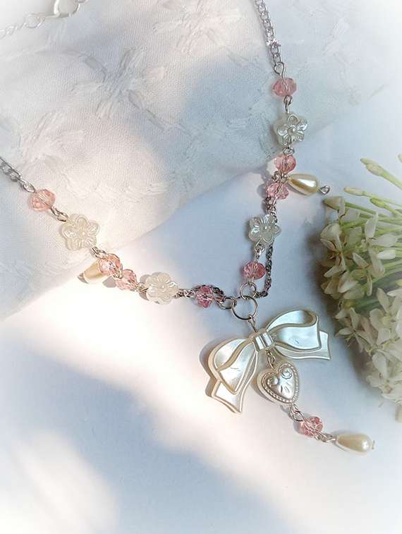pearl beaded bow detailed necklace - 22055059 - Standard Image - 1