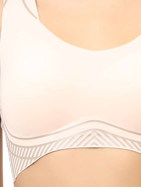 women solid lightly padded sports bra - 22055063 -  Standard Image - 4