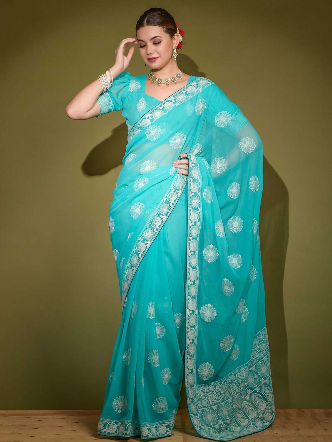 women solid with work embroidered saree with blouse