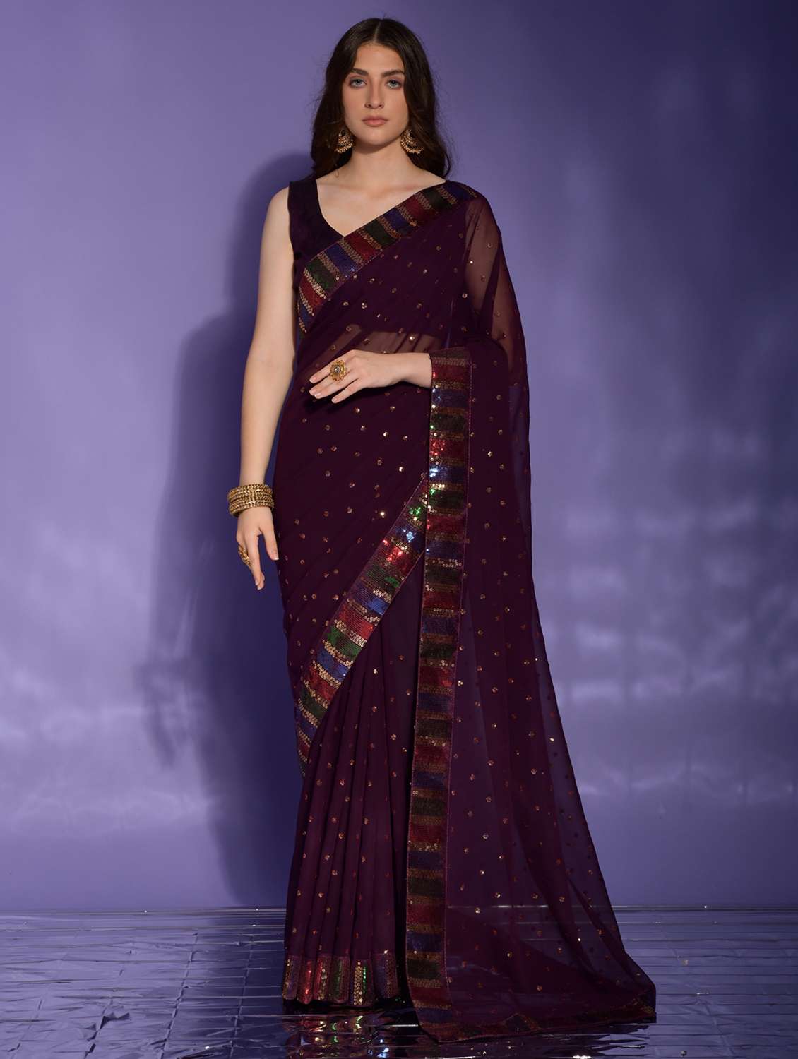 women solid with work embellished saree with blouse