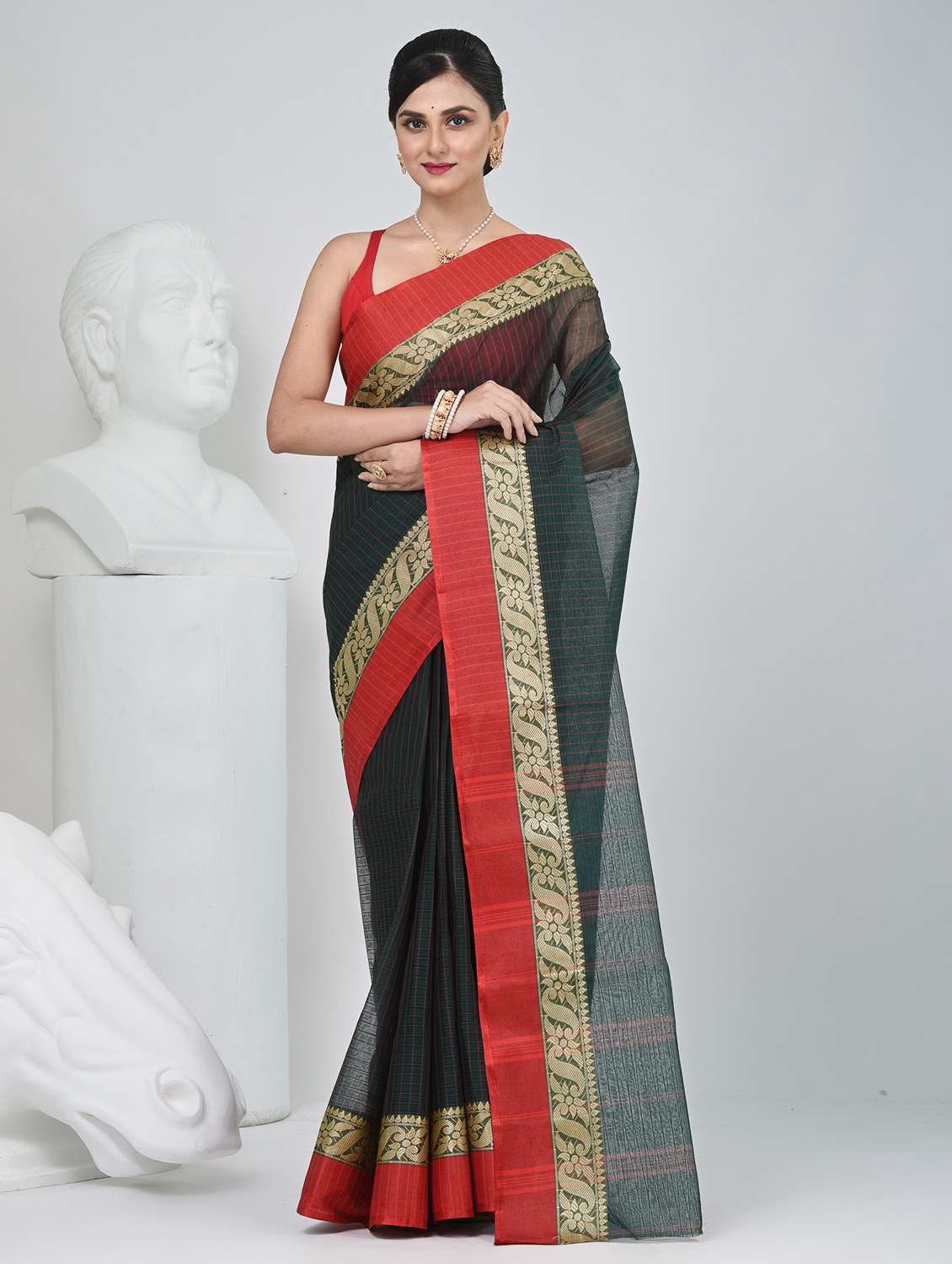 women striped tant saree