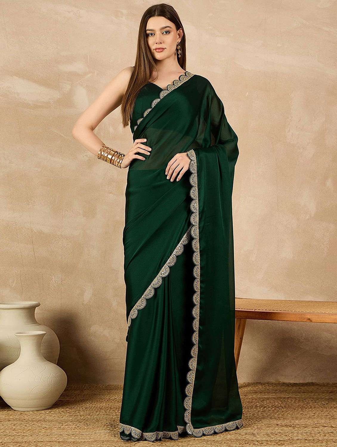 women solid with embellished bordered saree with blouse