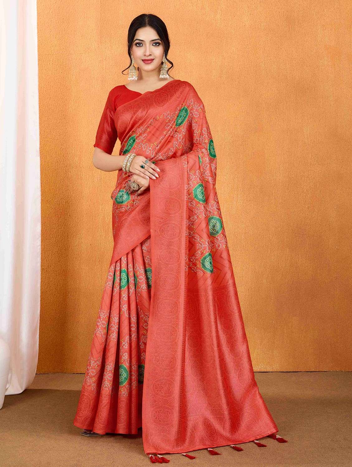 women bandhani printed bordered saree with blouse