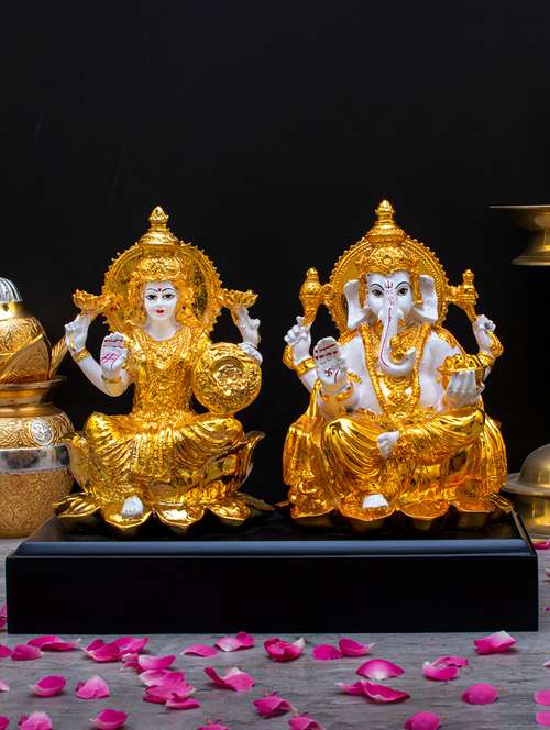  gold plated goddess lakshmi and lord ganesh murti - 22065649 -  Standard Image - 0