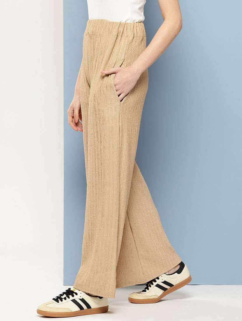 women solid mid rise flared palazzo - 22074043 - Standard Image - 1